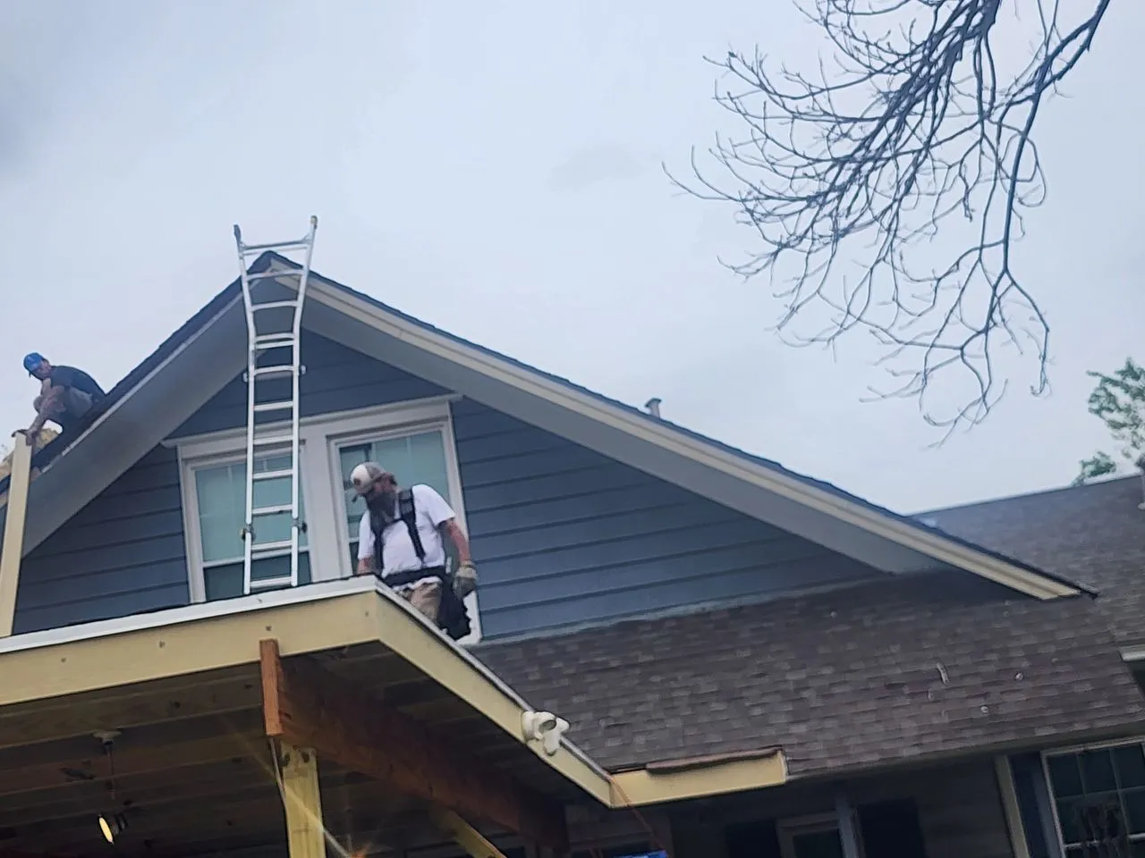 Ad Lib Family Construction roofing: 06 finished shingle