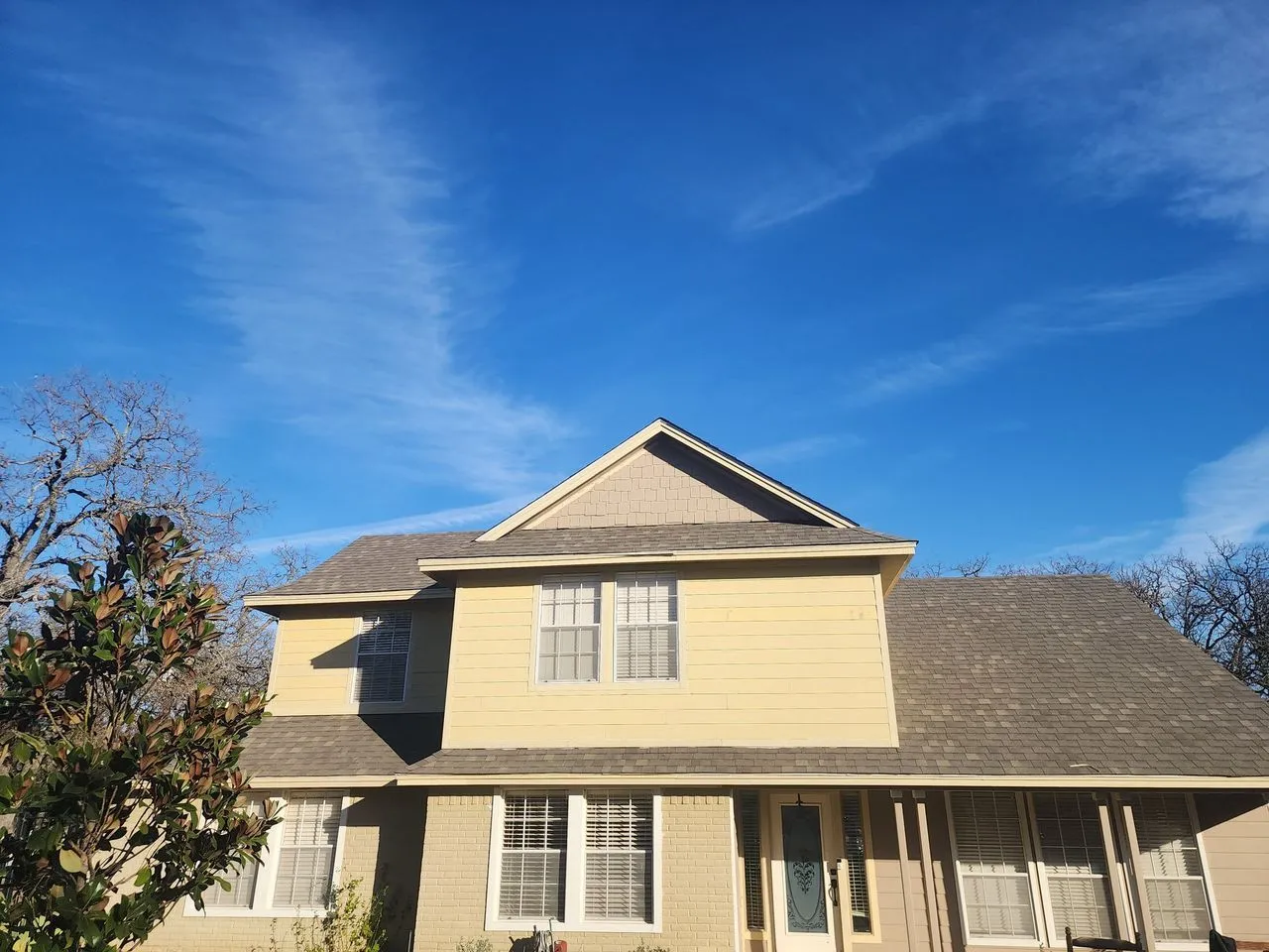 Ad Lib Family Construction exteriors: 07 two story yellow curb
