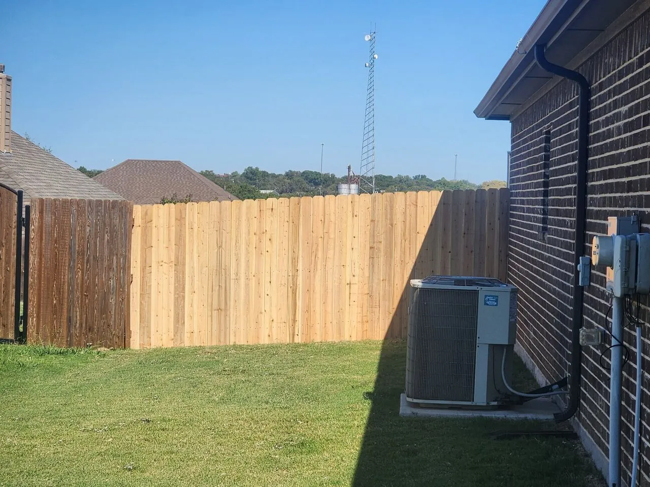 Ad Lib Family Construction fencing: 09 cedar fence full length