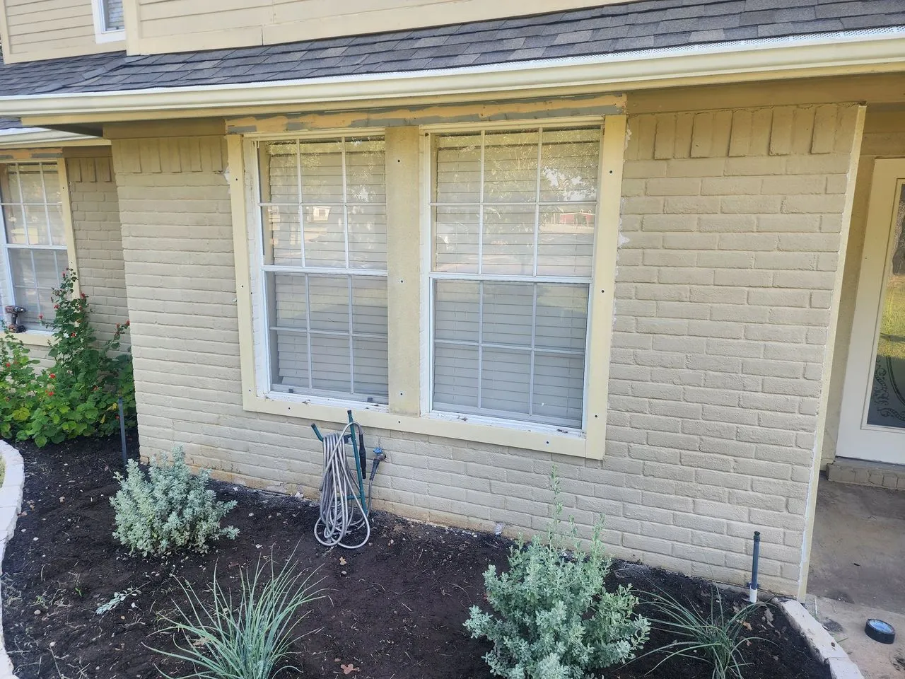 Ad Lib Family Construction exteriors: 10 painted brick trim