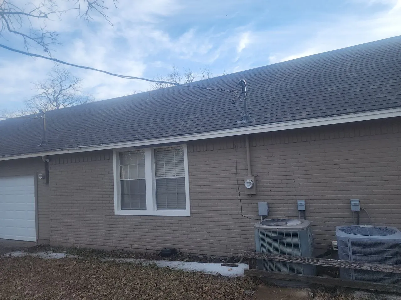 Ad Lib Family Construction roofing: 11 long rear roofline