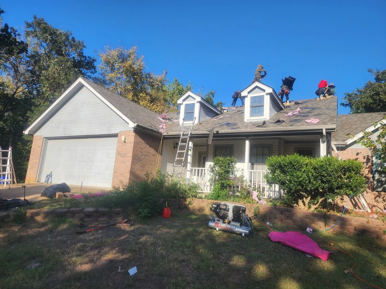 Ad Lib Family Construction roofing: 12 crew installing