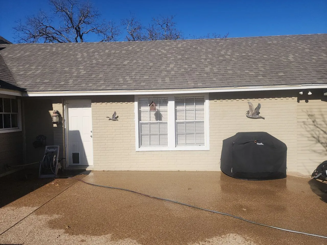 Ad Lib Family Construction patios & renovations: 12 rear patio painted brick